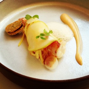 Eighth course at Eleven Madison Park: Lobster (Poached with Rutabaga, Black Pear, and Lovage)